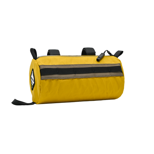 Yellow handlebar cycling bag with X-Pac recycled Fabric and hardshell design.