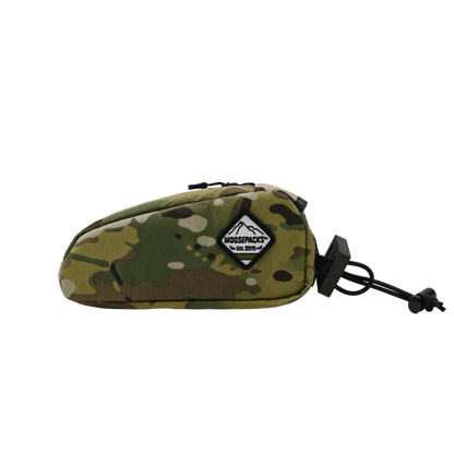 Multi Camo MoosePacks bolt-on cycling top tube pouch featuring integrated direct mount holes and YKK water-resistant zipper.