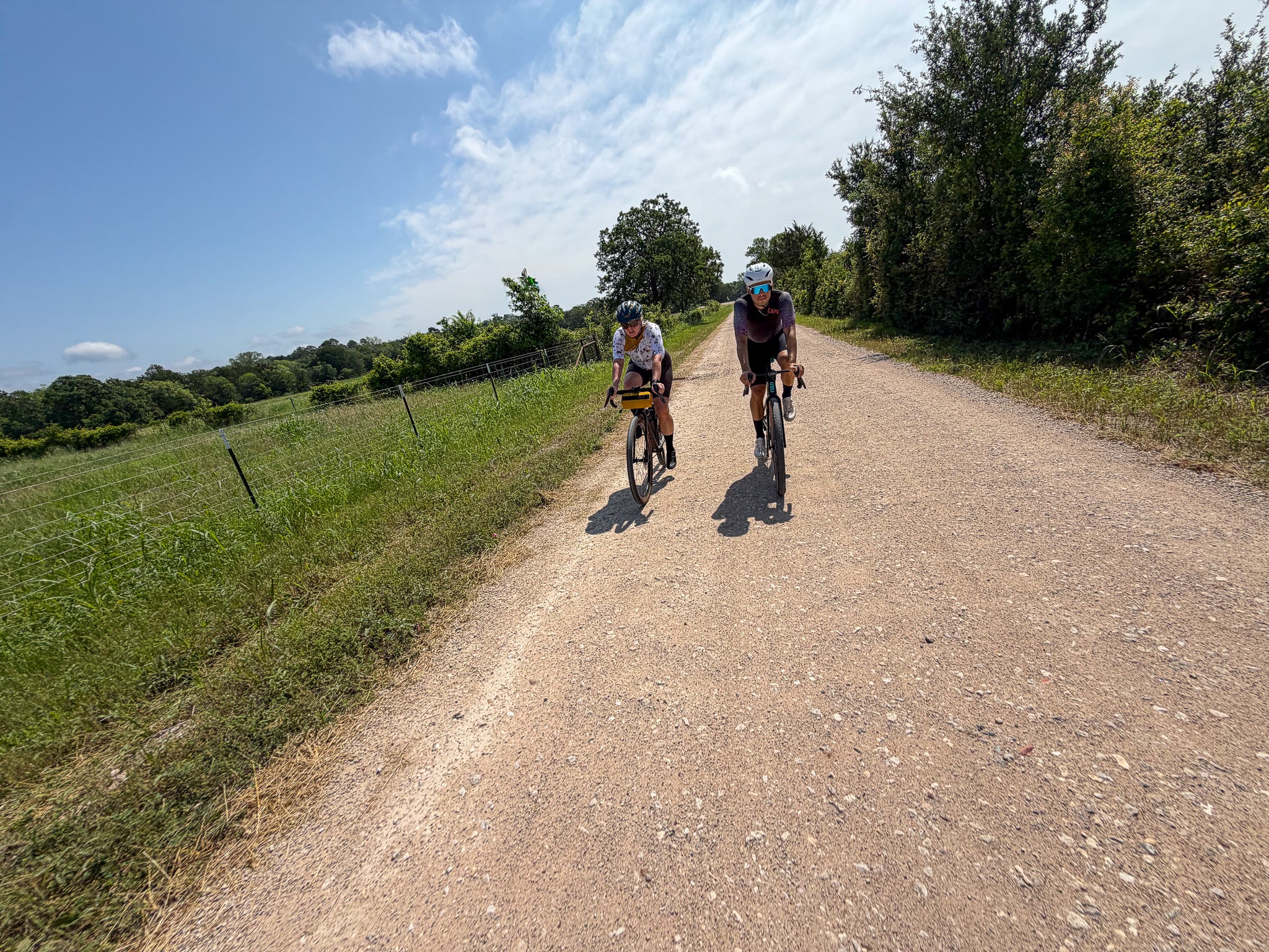 Two cyclist riding gravel with Handlebar Bag 
